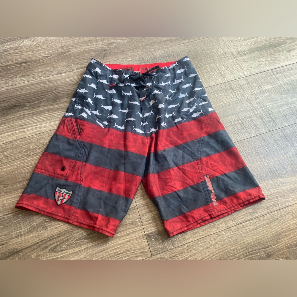 Pelagic sharkskin board shorts youth waist size 27 in great condition!